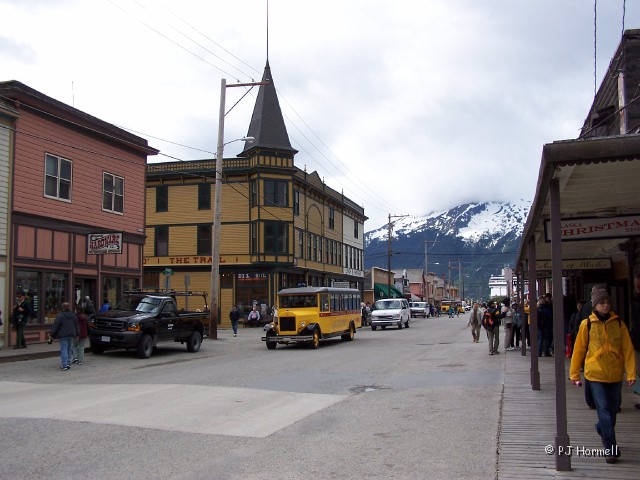 100_1456_AK_Skagway_Downtown.jpg - Downtown Skagway with some of the tourists and a Skagway Street Car. ~May 25, 2004 - Skagway, Alaska
