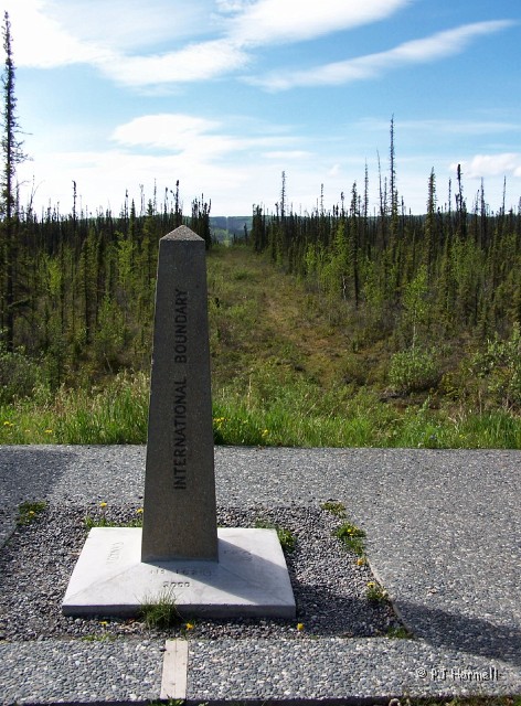 100_1674_AK-YT_AlaskaHwy_Boundary.jpg - International Boundary Marker - Clear cut line between the United States and Canada. ~June 1, 2004, Canada/Alaska, Mile Marker 1221, Alaska Highway - Alaska