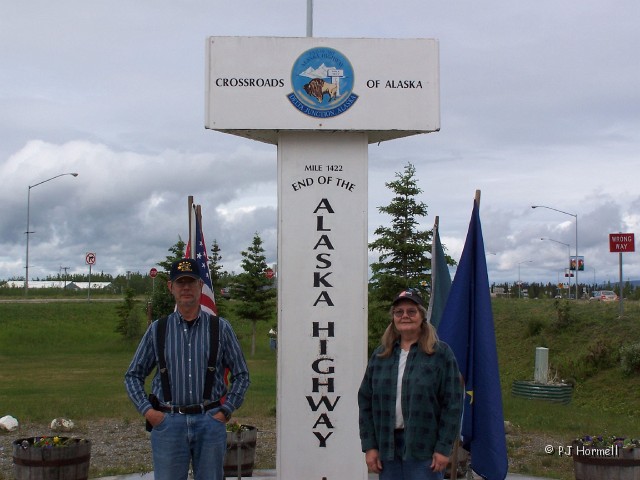 100_1708_AK_AlaskaHwy_Mile1422.jpg - We Made It! - Delta Junction... end of the Alaska Highway. June 3, 2004, Alaska, Mile Marker 1422, Alaska Highway - Delta Junction, Alaska