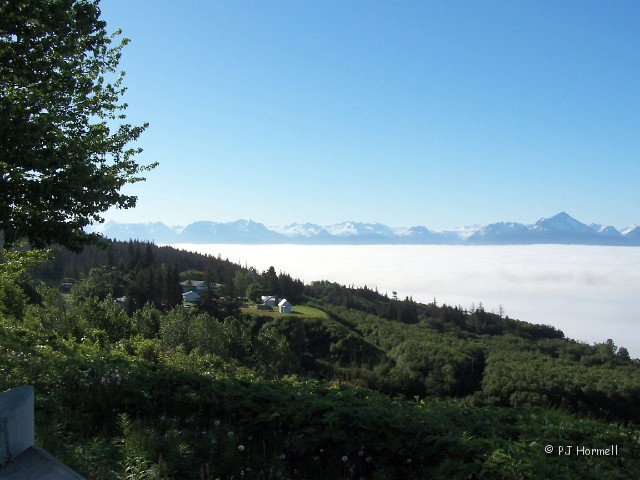 100_2297_AK_KenaiPeninsula_LowClouds.jpg - Kachemak Bay - Drove to Homer on a nice clear day... so we thought! At the overlook the clouds were so low they were right on top of the water. ~June 19, 2004 - Mile Marker 169, Sterling Hwy - Homer, Alaska