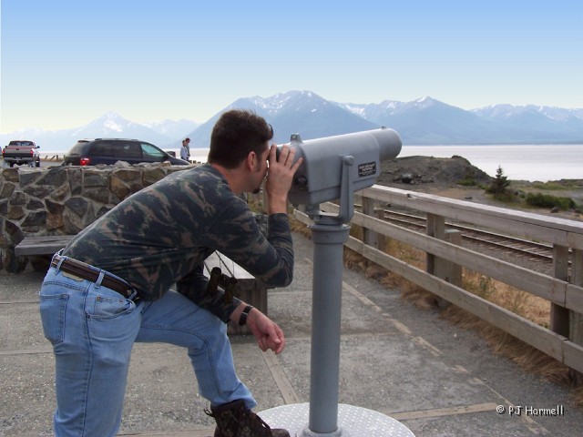 100_2494_AK_KenaiPeninsula_Brian.jpg - Brian - checking the view at Beluga Point for Dall Sheep on the distant mountains. ~June 27, 2004 - Mile Marker 110, Seward Hwy - Alaska