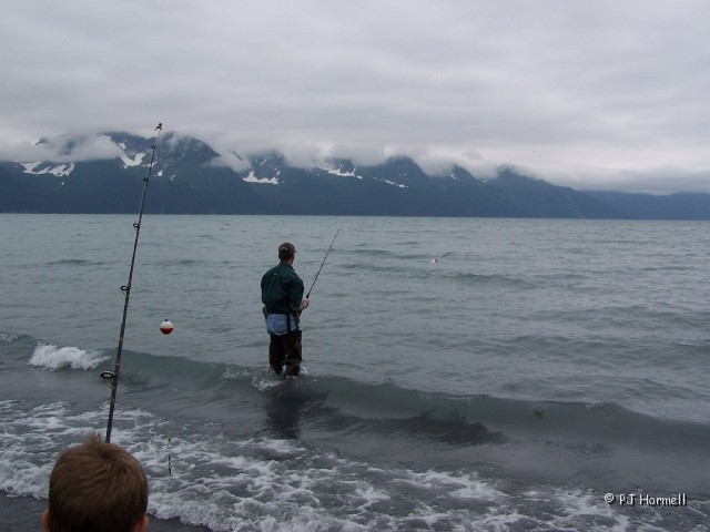 100_2954_AK_KenaiPeninsula_Family.jpg - Morgan and Brian fishing for salmon. A seagull kept swooping down to take the bait. ~June 28, 2004, Resurrection Bay - Seward, Alaska