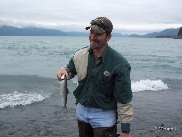 100_2971_AK_KenaiPeninsula_Family.jpg - Well... at least he caught something! ~June 28, 2004, Resurrection Bay - Seward, Alaska