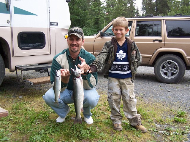 100_2972_AK_KenaiPeninsula_Family.jpg - Brian and Morgan comparing their catch of the day. ~June 28, 2004, Resurrection Bay - Seward, Alaska
