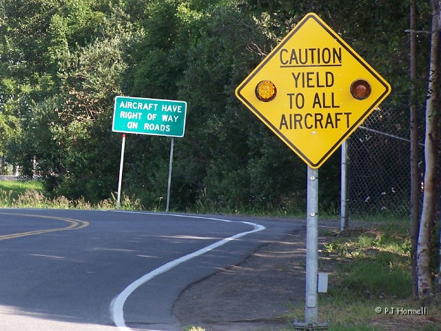 100_3354_AK_Anchorage_AirportSign.jpg - Signs seen around the Anchorage Airport. ~July 12, 2004 - Anchorage, Alaska