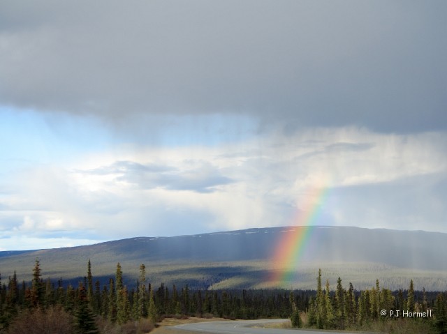 IMG_1289c_AK_GlennHwy_Rainbow.jpg - It doesn't look like it in this picture, but this was the brightest and biggest rainbow we have ever seen.  Glenn Highway,  Alaska.  ~June 1, 2006