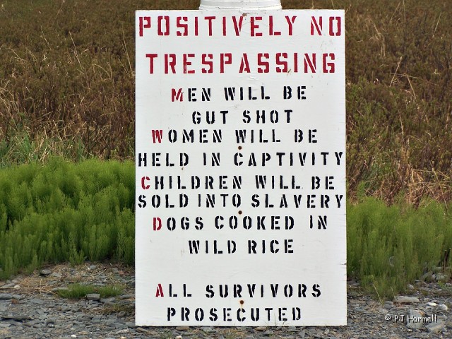 100_8511_AK_BayviewCampground_Sign_.JPG - Sign at the edge of the duck flats in front of the Bayview RV Park.  Guess they don't want you trespassing on the duck flats. Valdez, Alaska  ~May 31, 2006