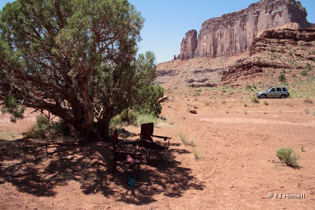 IMG_3092_UT_CanyonlansNP_LunchSpot.jpg - We ate lunch in this little spot of shade while exploring Shafer Trail.  The temperature was 94 degrees, so the shade felt good.  Moab, Utah  ~June 13, 2007